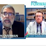 Two individuals in a virtual faith conference, themed Moving Forward in Faith, engage in discussion.